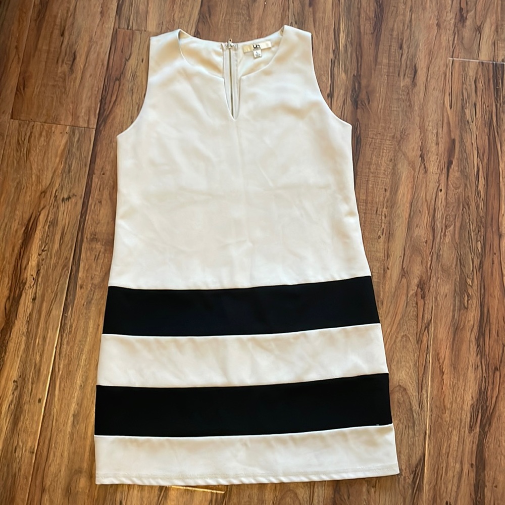 Sleeveless tan business casual dress